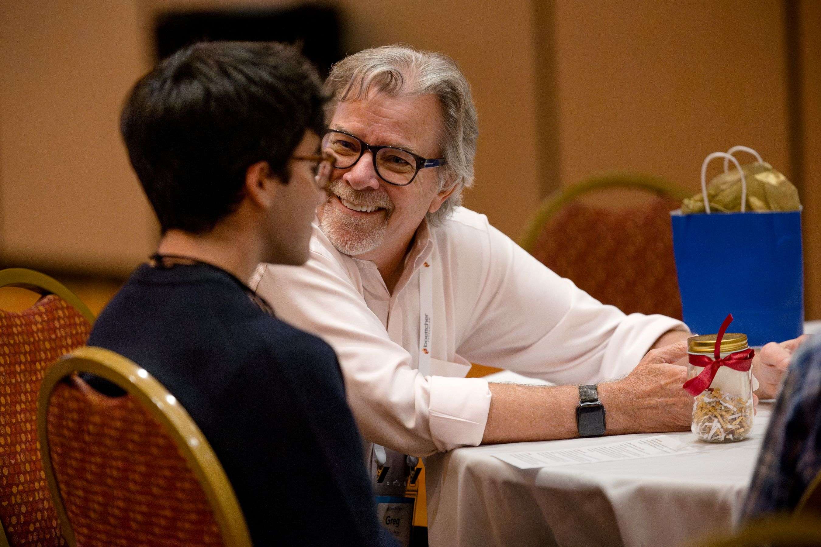 A Boettcher Alum Smiling at a Boettcher Scholar